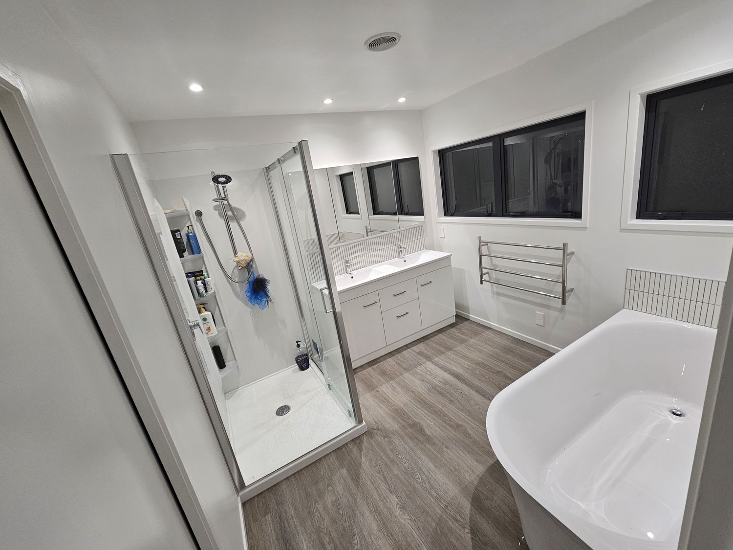 Taharoa renovation, modern bathroom with freestanding bath