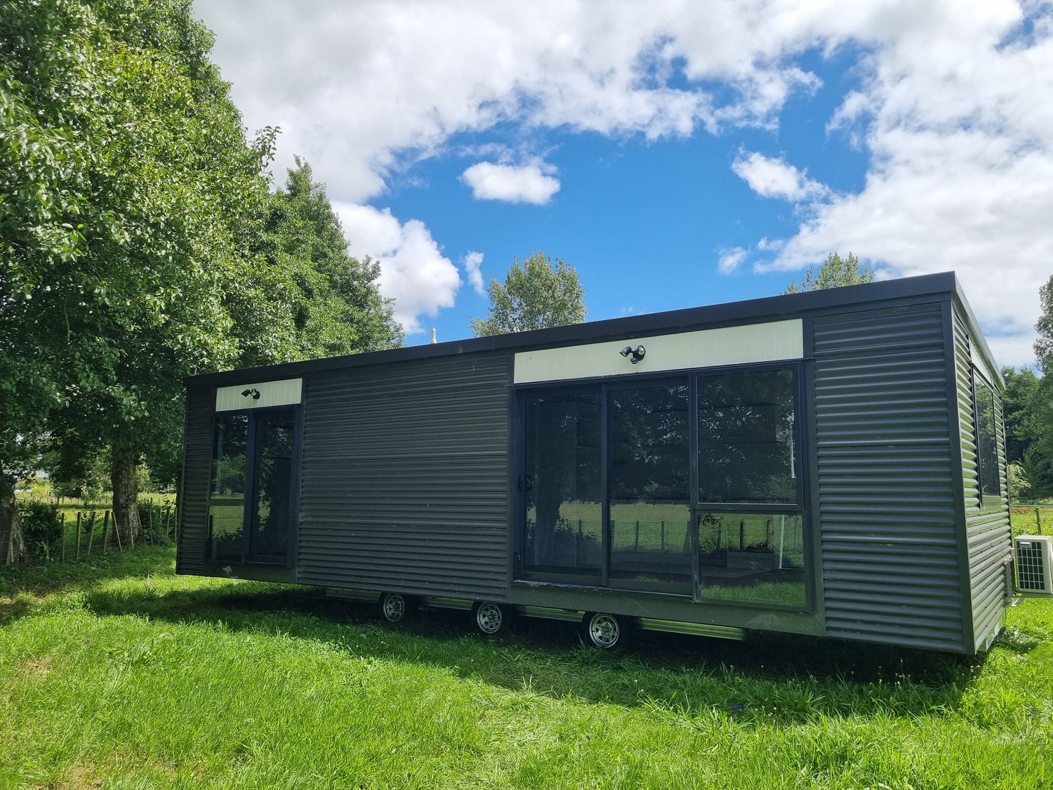 Transportable home, modern exterior in a rural setting